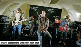  ?? ?? Marti performing with Wet Wet Wet