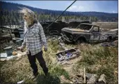  ?? JIM WEBER — SANTA FE NEW MEXICAN ?? Johnny Trujillo, 53, talks about battling a blaze that destroyed both his sister’s home and his truck in the evacuation area near Mora, N.M., on Wednesday.