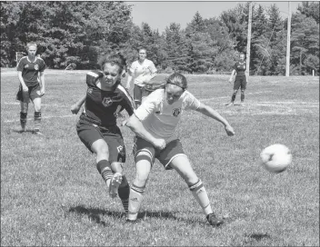  ?? SARA ERICSSON ?? Valley United U-17 AAA player Ellen Lawrence pressures a Highland FC player in the offensive zone.