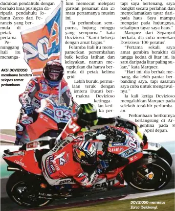  ??  ?? AKSI DOVIZIOSO membawa bendera selepas tamat perlumbaan. DOVIZIOSO memintas Zarco (belakang).