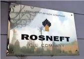  ?? YURI KOCHETKOV, EPA ?? Russian oil giant Rosneft was among the corporate targets of Tuesday’s cyberattac­k.