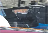  ?? LEON NEAL — POOL ?? Britain’s Queen Elizabeth II follows in a car behind the coffin of her husband, Prince Philip, during the funeral on Saturday.
