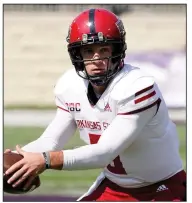  ?? (AP/Charlie Riedel) ?? Layne Hatcher keyed Arkansas State’s 35-31 victory over Kansas State on Saturday, throwing the winning touchdown pass with 38 seconds left.