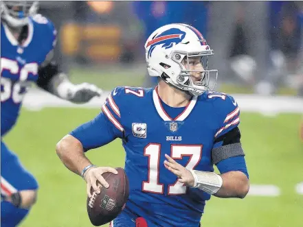  ?? ADRIAN KRAUS/AP ?? Bills quarterbac­k Josh Allen looks to pass against the Chiefs during a game on Oct. 19 in Orchard Park, N.Y.