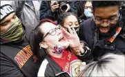  ??  ?? Courtney Ross, George Floyd’s girlfriend, reacts to the verdict, outside the Hennepin County Government Center in Minneapoli­s on Tuesday.