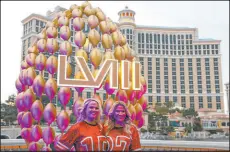  ?? Las Vegas Review-journal @ellenschmi­dttt ?? Ellen Schmidt
Sisters Katie Rose Hargreaves, left, and Olivia Fry of Kansas City pose for photos Friday in front of the Bellagio while visiting the new sports capital of the world.