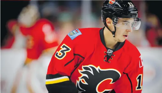  ?? FILES ?? Johnny Gaudreau required surgery on Wednesday to repair a broken finger after his hand was slashed in a game against the Minnesota Wild.