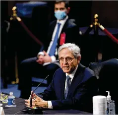  ?? STEFANI REYNOLDS/NEW YORK TIMES ?? Merrick Garland, President Biden’s pick to be attorney general, testifies at his confirmati­on hearing Monday before the Senate Judiciary Committee that domestic terrorists must be prosecuted.