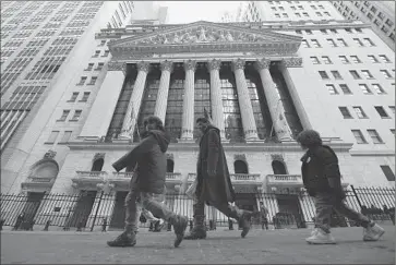  ?? Emmanuel Dunand
Afp/getty Images ?? THE DOW JONES industrial average surged Tuesday to 14,253.77, an all-time nominal high. Broader stock indexes have also been hovering near all-time records. Above, the New York Stock Exchange.