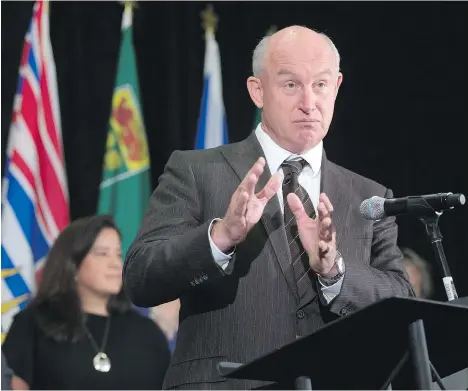  ?? DARRYL DYCK/THE CANADIAN PRESS ?? B.C. Solicitor General Mike Farnworth, seen at a press conference last week, says that the federal government should be more concerned about protecting children and excluding criminals on the marijuana file than “how much money you’re going to make.”