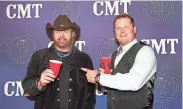  ?? ERIKA GOLDRING/GETTY IMAGES ?? Toby Keith, left, and Roger Clemens attend the 2012 CMT “Artists Of The Year” Awards at The Factory at Franklin on Dec. 3, 2012, in Franklin, Tennessee.