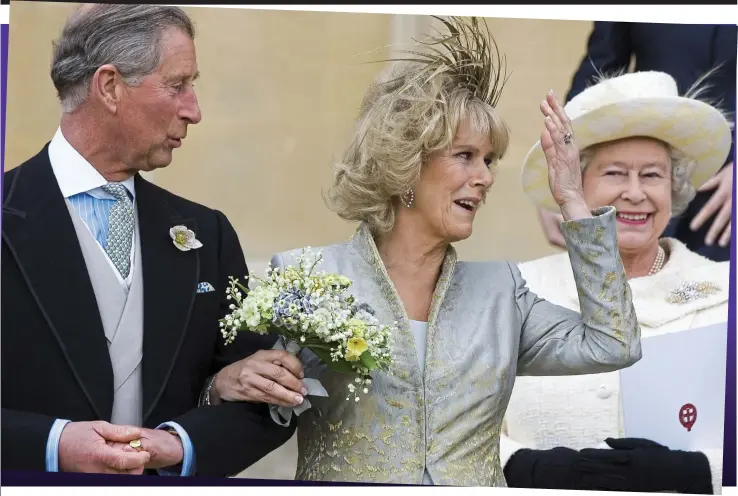  ?? Picture: REX ?? Together at last: Charles and Camilla on their wedding day. The beaming Queen gave the couple her blessing with a touching speech