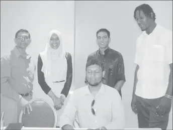  ??  ?? Habeeb Alli (seated), flanked by (from left) Petamber Persaud and poets Salimah Hussain, Zaheer Zamaluddin and Jamie Meyers