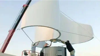  ??  ?? A screen capture from an Arc Energy video which the company says shows the installati­on of an Enviro-Energies wind turbine on the garage of former Tonight Show host Jay Leno, pictured above.