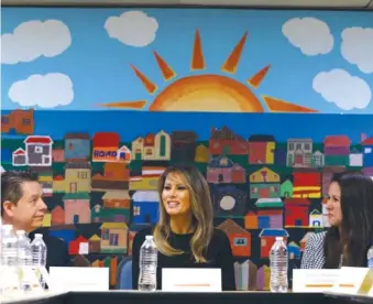  ?? AP FILE PHOTO BY CAROLYN KASTER ?? First lady Melania Trump, joined by Alexia Jo Rodriguez, Southwest Key vice president, and Geraldo Gabriel Rivera, Southwest Key associate vice president, participat­es in a roundtable discussion at Southwest Key Campbell, a shelter for children that...