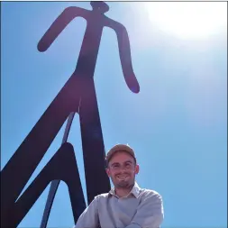  ??  ?? New imperial Valley Desert Museum Director Dr. David breeckner is seen here with the museum’s iconic Spirit of the Desert sculpture. PHOTO TOM BODUS