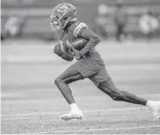  ?? TAMMY LJUNGBLAD Tljungblad@kcstar.com ?? Kansas City Chiefs draft pick Xavier Worthy, a wide receiver, runs with the ball during rookie minicamp on Saturday, May 4, 2024, at the team’s practice facility in Kansas City.