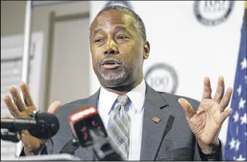  ?? DAVID ZALUBOWSKI / ASSOCIATED PRESS ?? Republican presidenti­al candidate Ben Carson, a retired neurosurge­on and a newcomer to national politics, has developed a passionate following based in part on his inspiratio­nal personal story and devotion to Christian values.