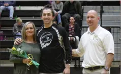  ?? Kevin Myrick / SJ ?? Senior Michael Gay is celebrated between games Friday at Rockmart for one of his last regular home games for the season on Senior Night.