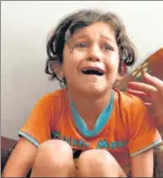  ?? AFP ?? A child cries during the funeral of a relative who died due to an airstrike, in Jabalia, Gaza Strip.