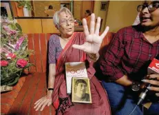  ?? — Reuters ?? Nirmala Banerjee, mother of Abhijit Banerjee, one of the winners of 2019 Nobel Economics Prize, speaks to media at her house in Kolkata.