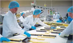  ?? Picture: Getty. ?? Top: New Walkers Shortbread chairman Bob Brannan. Above: The Walkers shortbread packing line.