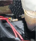  ?? ?? A battery under the exhaust is a very common find when surveying or dealing with insurance claims!