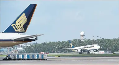  ?? ROSLAN RAHMAN/AFP/GETTY IMAGES ?? The non-stop flight is mainly meant to appeal to business types, hence why Newark was chosen as the New York gateway.