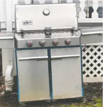  ?? KaTIE WORKMAN/THE ASSOCIATED PRESS ?? If your grill is in need of some upkeep after sitting unused during the winter months, make sure you give it a thorough once-over so it’s safe and worthy of cooking your food.