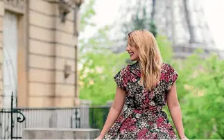  ?? AINSELY DUYVESTYNS­MITH ?? Chilling on a balcony with a view of the Eiffel Tower - as you do.