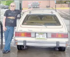  ?? Keith Bryant/The Weekly Vista ?? Justin Brunje stands with his 1985 AMC Eagle wagon.