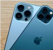  ?? ?? The iPhone 13 Pro Max in Sierra Blue below and the iPhone 12 Pro in Pacific Blue above.