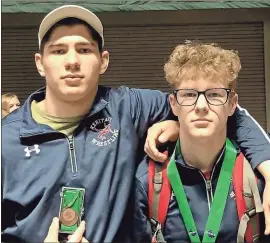  ?? Contribute­d ?? Heritage senior Alex Eacret and Heritage freshman Drew Dietz are the 2019-20 Catoosa County Co-wrestlers of the Year.