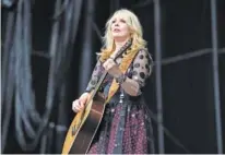  ?? PHOTO BY NICK WASS/INVISION/AP ?? Nancy Wilson of Heart performs at RFK Stadium in Washington on July 4, 2015. Wilson released her first solo album, “You and Me.”