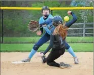  ?? GENE WALSH — DIGITAL FIRST MEDIA ?? CB South’s Kaylee Richards slides safe into second as North Penn shortstop Jamie Beer reaches for the throw Monday.