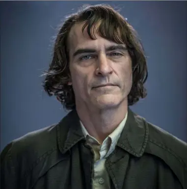  ?? WARNER BROS. PICTURES ?? Joaquin Phoenix portrays a new version of the Gotham City madman in “Joker.”