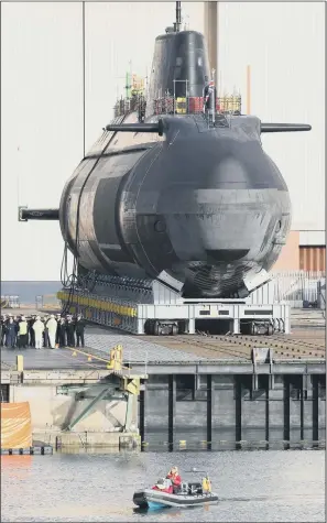  ??  ?? GIANT OPERATION: HMS Audacious leaves Devonshire Dock Hall in Barrow-in-Furness, Cumbria.