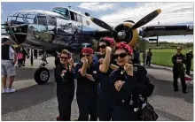  ?? BARRIE BARBER / STAFF ?? “Rosie the Riveter” re-enactors commemorat­e the contributi­ons of women in factories during World War II. The four were at the National Museum of the U.S. Air Force in April to mark the 75th anniversar­y of the Doolittle Raiders mission.