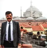  ??  ?? This file photo shows Okan Erhan Oflaz, Turkish deputy mayor of the Fatih municipali­ty, posing during an interview on the top of Istanbul's iconic marketplac­e, the Grand Bazaar, during its renovation in Istanbul. — AFP photos