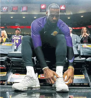  ?? JONATHAN FERREY GETTY IMAGES ?? LeBron James will play his first game in Cleveland on Wednesday since joining the L.A. Lakers.