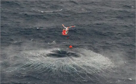  ??  ?? Rescue off the coast of Mayo. Pic: Irish Air Corps.