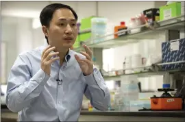  ?? MARK SCHIEFELBE­IN – ASSOCIATED PRESS ARCHIVES ?? Chinese scientist He Jiankui claims he helped make the world’s first geneticall­y edited babies: twin girls whose DNA he said he altered. He revealed it Nov. 26, in Hong Kong to one of the organizers of an internatio­nal conference on gene editing.