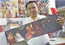  ?? The Assassin (AFP) ?? Chen Chung-hsin displaying his fashion designs for the movie