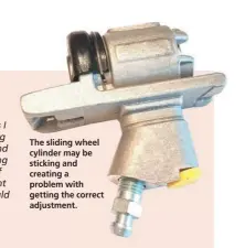  ?? ?? The sliding wheel cylinder may be sticking and creating a problem with getting the correct adjustment.