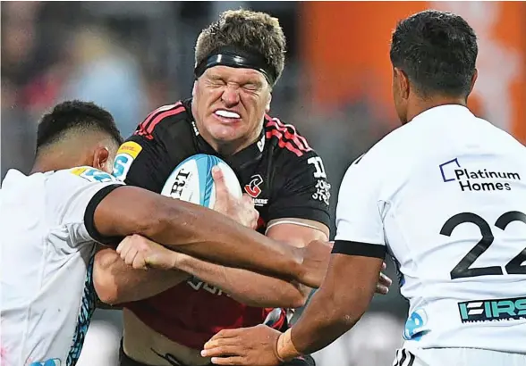  ?? Photo: Chris Symes / Photosport ?? Crusaders player Scott Barrett faces a wall from the Chiefs during the Super Rugby Pacific match in Christchur­ch.