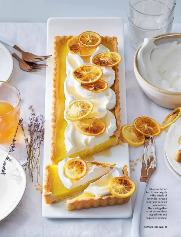  ??  ?? Take your lemon tart to new heights with a drizzle of lavender -infused honey and candied lemon slices. The stir-together crust has only four ingredient­s and requires no rolling.