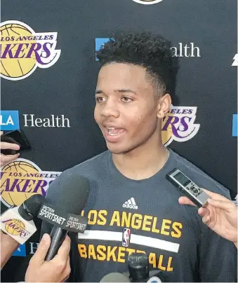  ?? GREG BEACHAM/THE ASSOCIATED PRESS ?? Markelle Fultz speaks with reporters after his workout with the Los Angeles Lakers on Thursday. The University of Washington guard could be the No. 1 pick in the NBA draft.