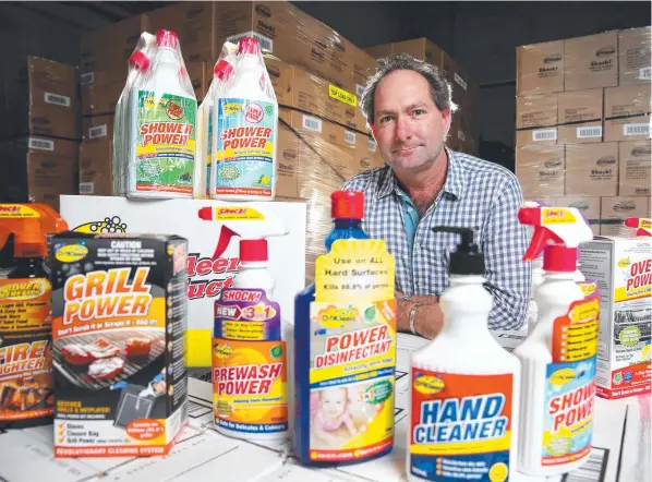  ?? Picture: ADAM HEAD ?? OzKleen CEO Mark Quinn at Ormeau with some of the products his company manufactur­es.