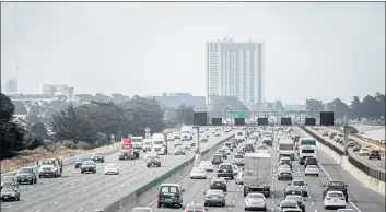  ?? PHOTO BY ANNE WERNIKOFF/CALMATTERS ?? Morning commuters head toward Oakland on July 22, 2019..