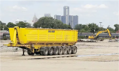  ?? NICK BRANCACCIO ?? Demolition equipment sits on the site of the former General Motors transmissi­on plant on Sunday. There is a plan to turn it into a large parking lot for vehicles transporte­d in and out of Windsor by train and truck.